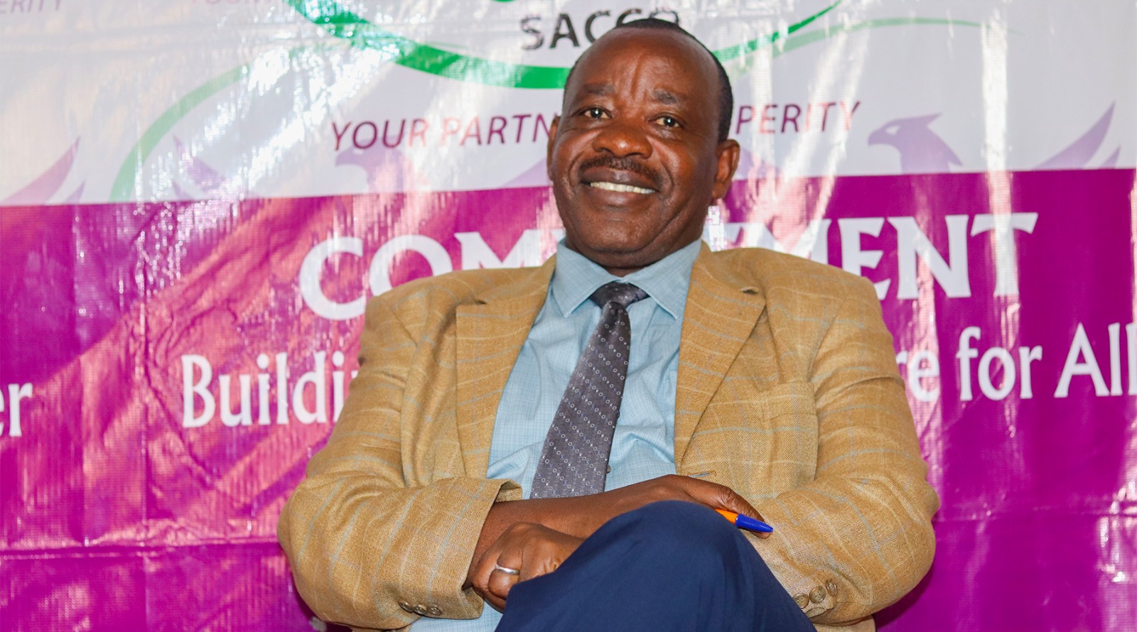 UASA SACCO official at a members' forum
